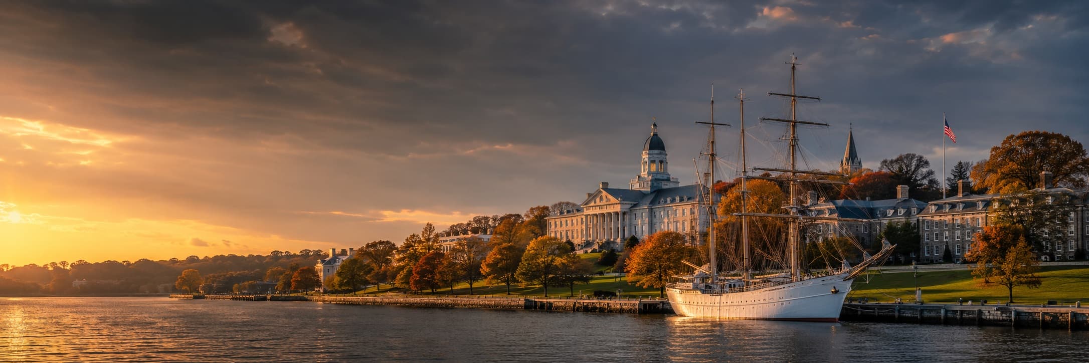 Coast Guard Academy along the Thames River with tall ship Eagle moored at dock