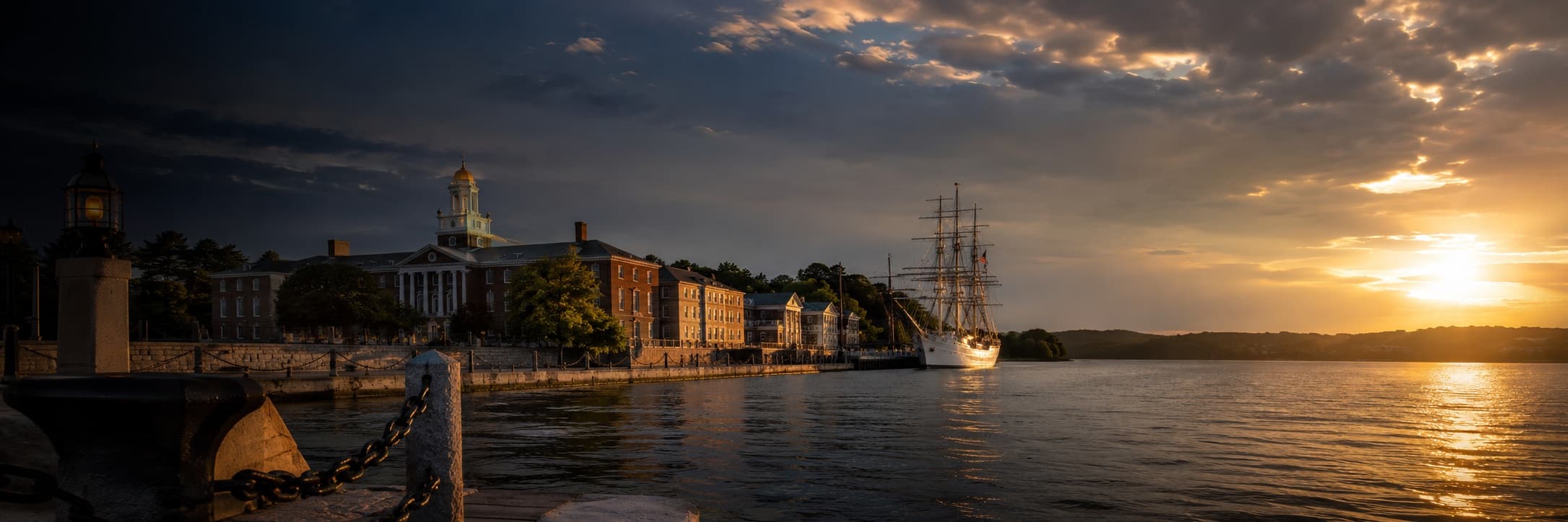 Maritime academy waterfront at Kings Point with tall ship training vessel at dock